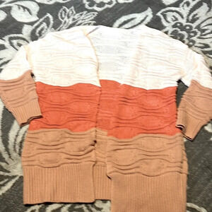 Cardigan boutique bought. Like new.